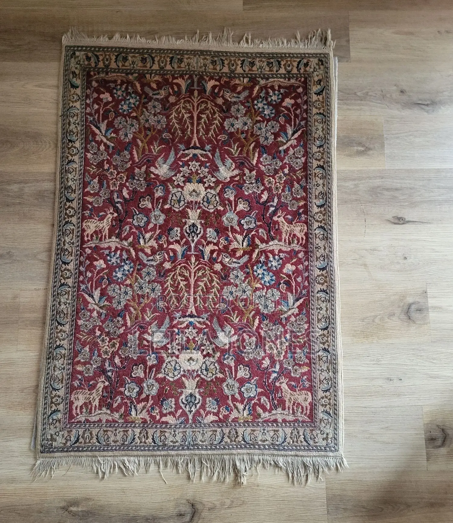 Two Persian Carpets
