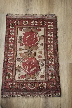 Two Persian Carpets