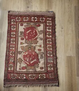 Two Persian Carpets