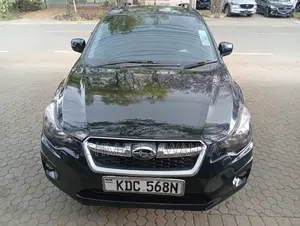 Subaru Impreza 2.0i Limited PZEV 4dr Hatchback AWD (2.0L 4cyl CVT) 2014