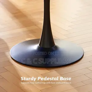 Black Round Pedestal Dining Table.