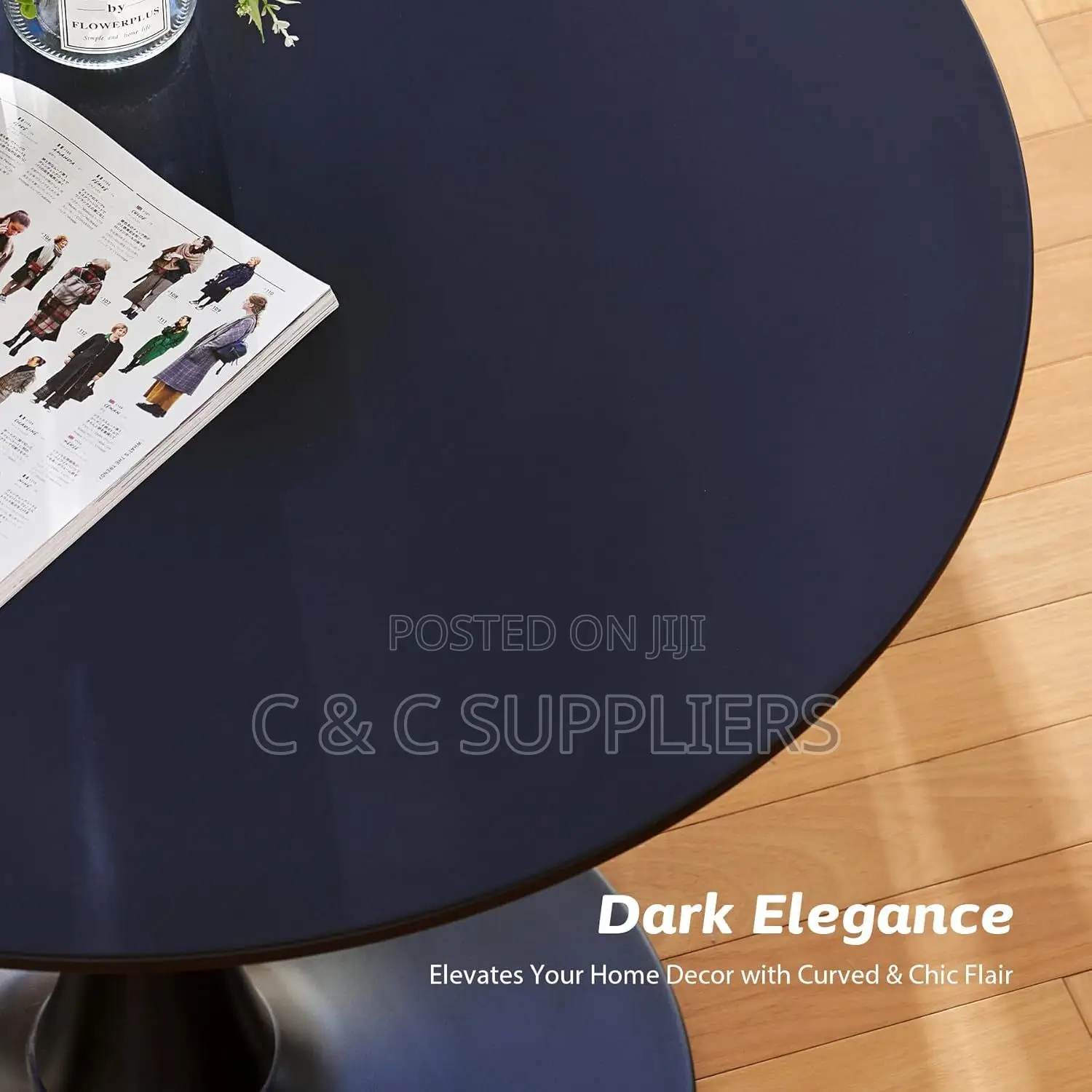Black Round Pedestal Dining Table.