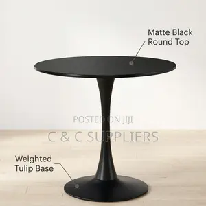 Black Round Pedestal Dining Table.