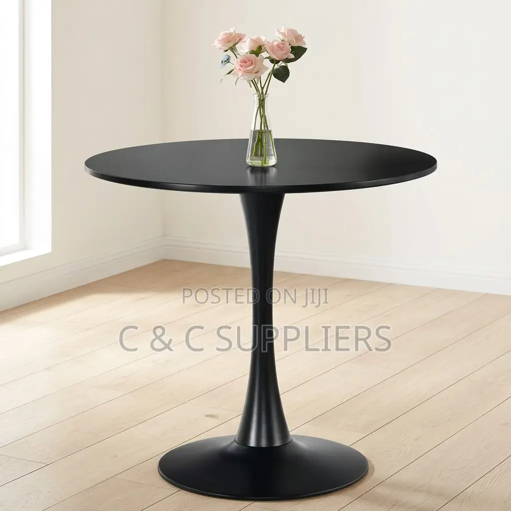 Black Round Pedestal Dining Table.