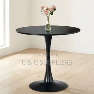 Black Round Pedestal Dining Table.