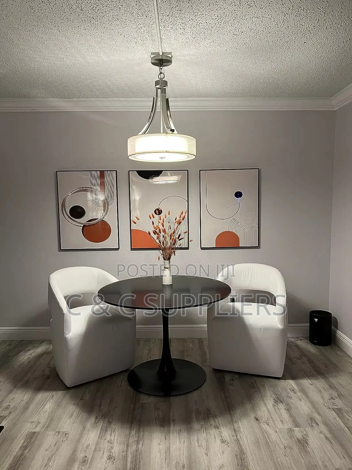 Black Round Pedestal Dining Table.