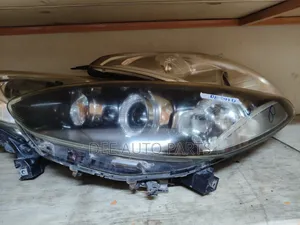 Mazda Demio 2010 Headlights