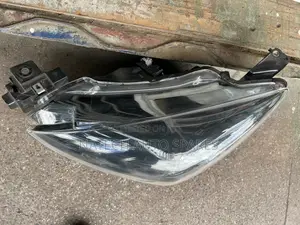 Mazda 2 Demio (DB) Headlight