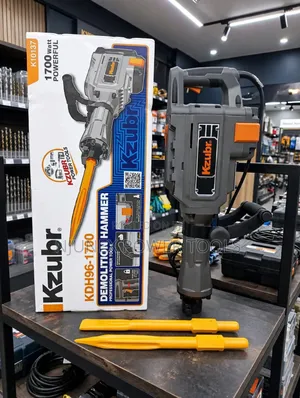 Kzubr KDH96-1700 Demolition Hammer Alongside Its Original Packaging
