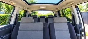 Comfortable 8-Seater Chauffeur-Driven Van for Hire