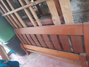 5 by 6 Mahogany Bed
