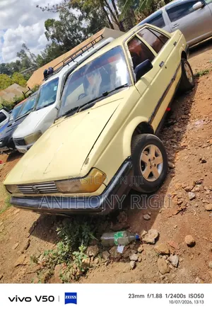 Nissan Sunny B12 Sedan 1.3 1990 Yellow
