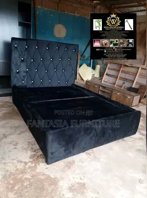 5 by 6 Black Chesterfield Bed