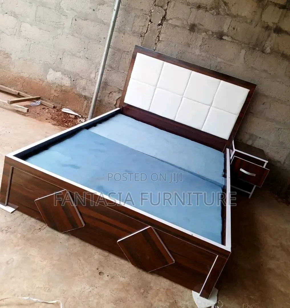 5 by 6 Brown Board and White Fabric Bed.