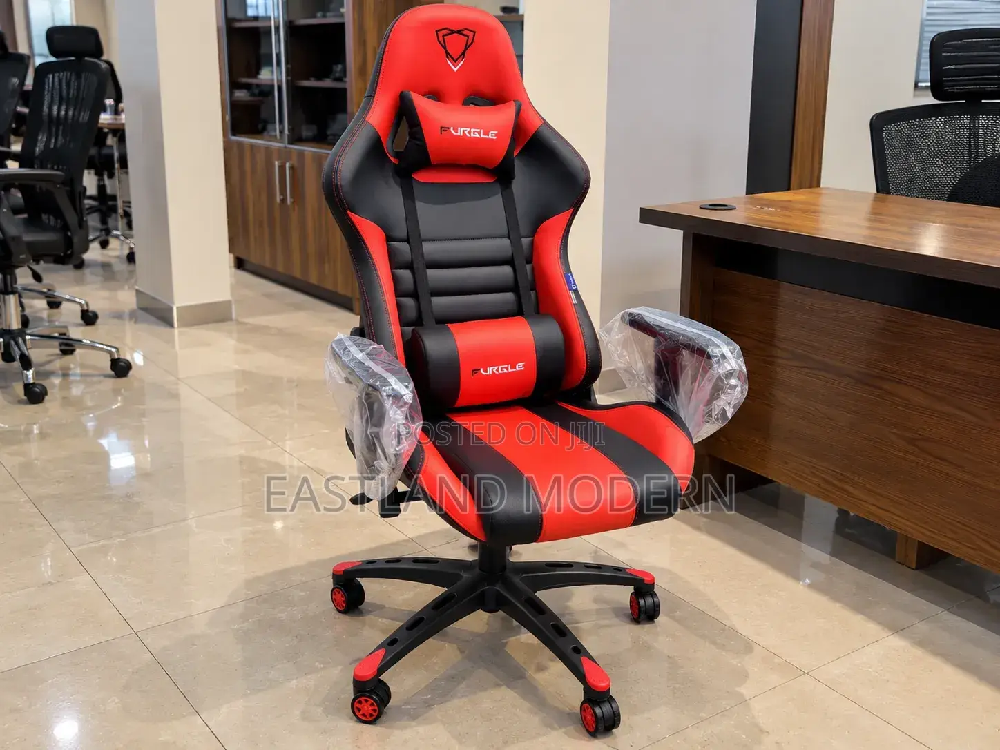 Red and Black Gaming Chair With Headrest.