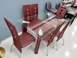 Glass Dining Table With 6 Leather Chairs.