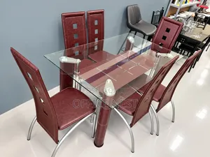 Glass Dining Table With 6 Leather Chairs.