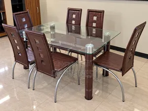 Glass Dining Table With 6 Leather Chairs.