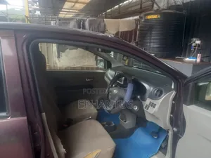 Daihatsu Mira 2013 Maroon