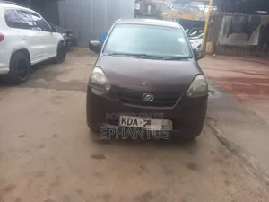 Daihatsu Mira 2013 Maroon
