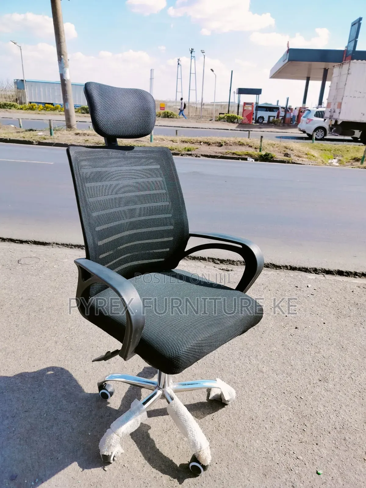 Black Chair With Headrest and Armrests