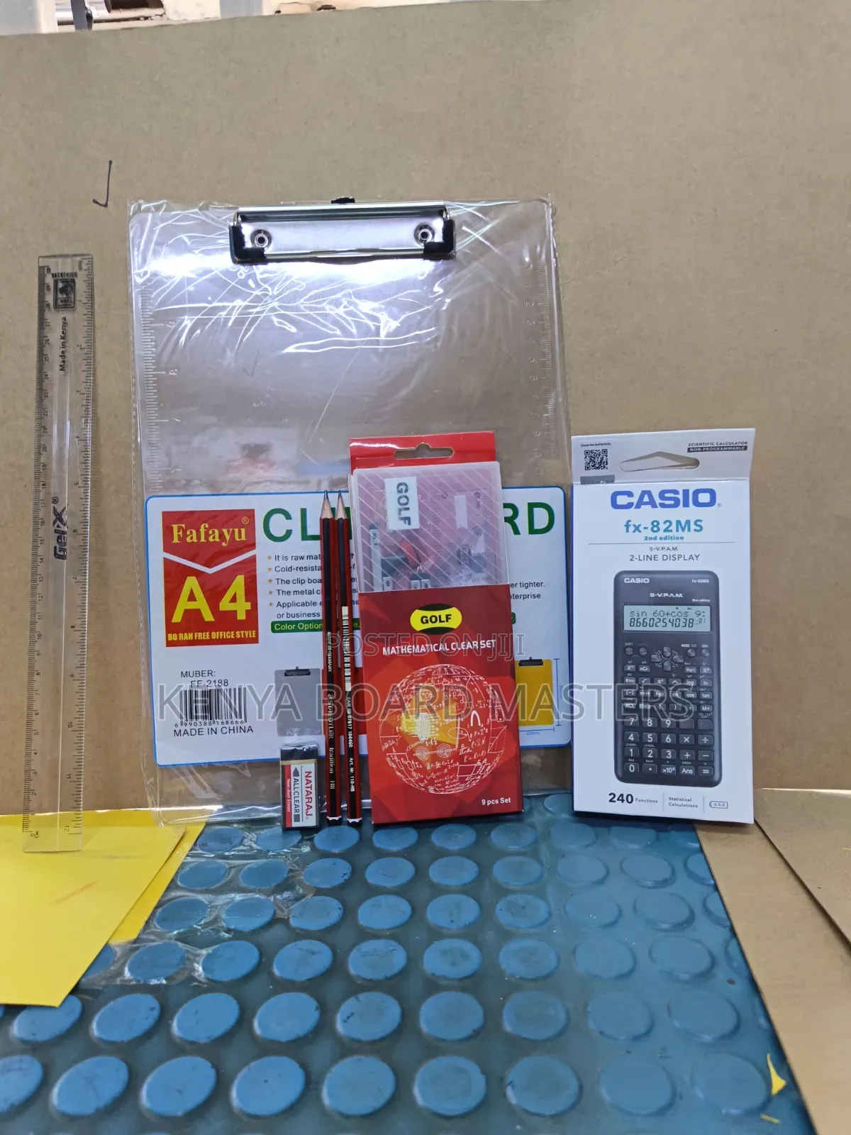 Clipboard, Calculator, Geometry, Ruler, 2 Pencils and Rubber