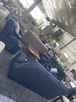 A Seven Seater Comfy Semi Recliner & Coffee Table