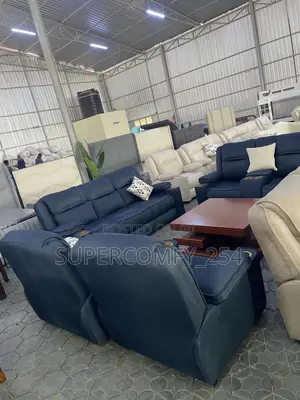 A Seven Seater Comfy Semi Recliner & Coffee Table