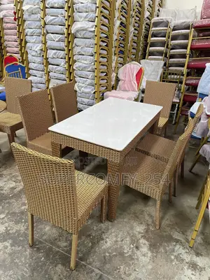 A Golden Detailed Six Seater Outdoor Dining Set