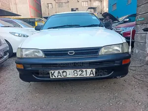 Toyota Corolla Hatchback 1999 White