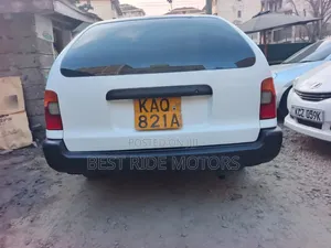 Toyota Corolla Hatchback 1999 White