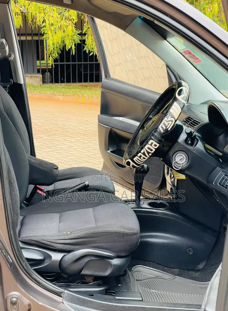 Mazda Demio 2006 Brown