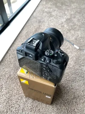 *Nikon D5600 + 35mm F/1.8g DX - Clean, With Box - Londiani/Nairobi*