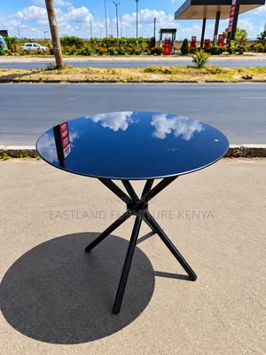 Modern Round Coffee Table – Glossy Top With Stylish Metal Base