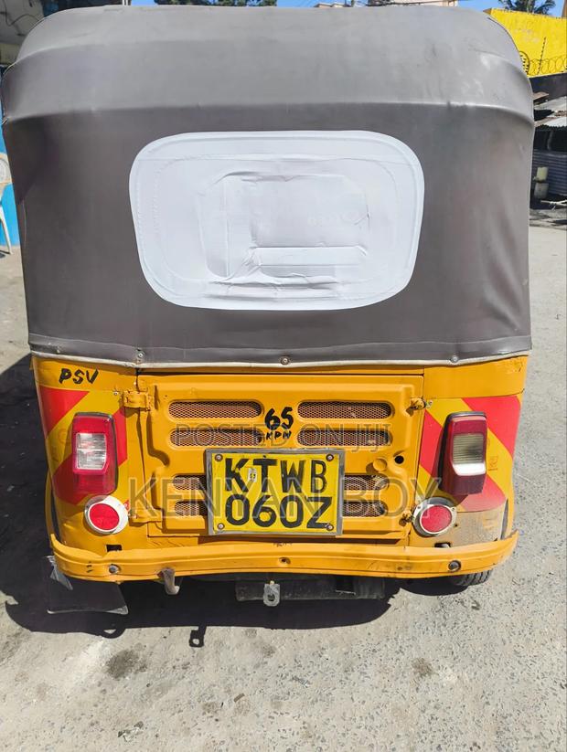 Bajaj RE 2023 Yellow - thumbnail 4