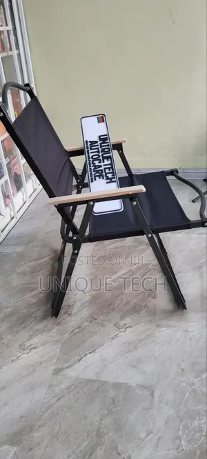 Black Portable Outdoor Chair With Light Wooden Armrests