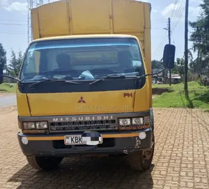 Mitsubishi FH 2009 Yellow