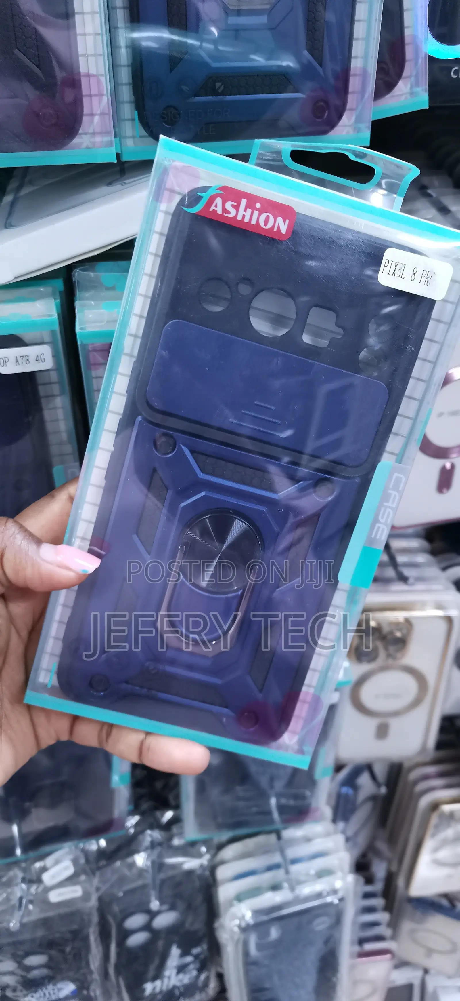Blue Case With a Sliding Lens Cover a Ring Stand Google Pixel 8 Pro
