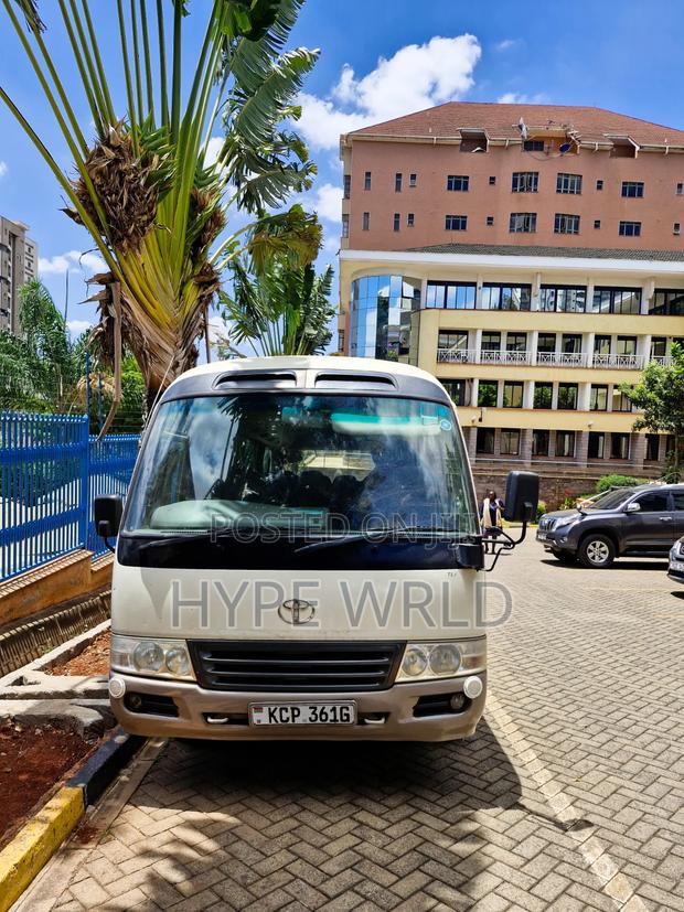 Toyota Coaster 2010 White - main view