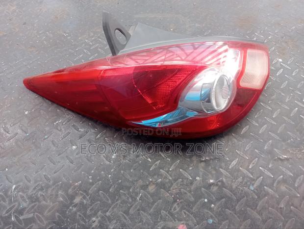 Nissan Tiida 2012 Headlight - main view