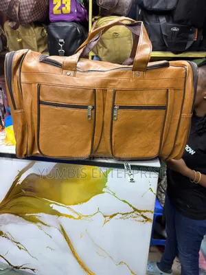 Pockeys Well Partitioned Brown Duffle Bags
