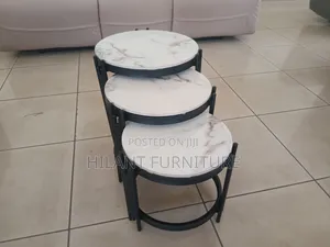 3 in 1 Round Marble Nesting Stools With Black Metallic Stands.