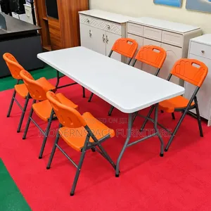 Folding Table With Orange Chairs (New