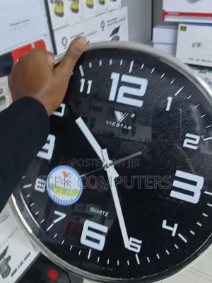 Smart Clock Camera for Monitoring Home and Office Environments