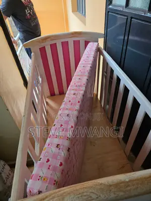 Baby Cot With a Mattress and Net