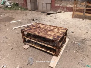 Brown Coffe Table With Storage Shelves.