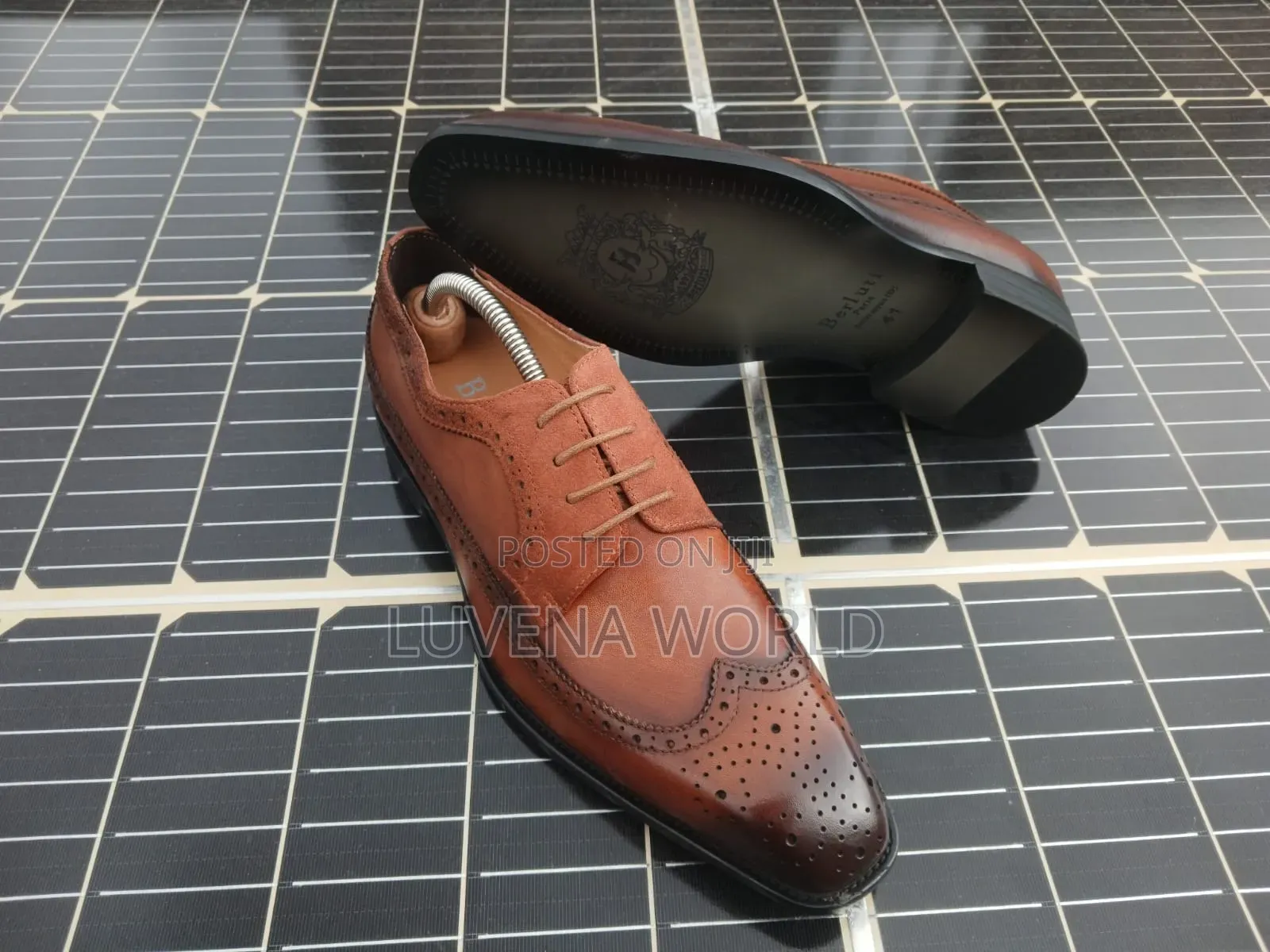Berluti Leather Officials