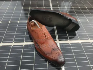 Berluti Leather Officials