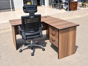 L Shaped Desk With Swivel Mesh Chair.