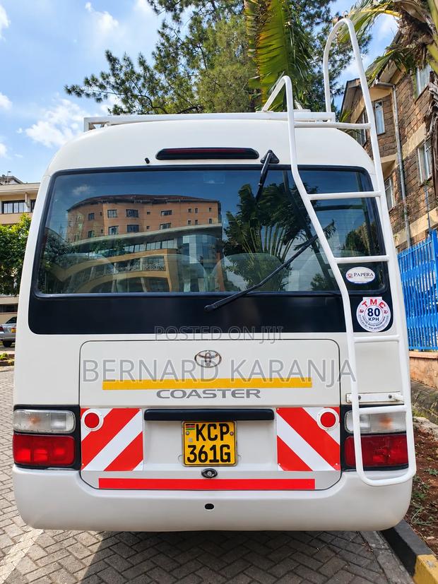 Toyota Coaster 2010 White - thumbnail 3